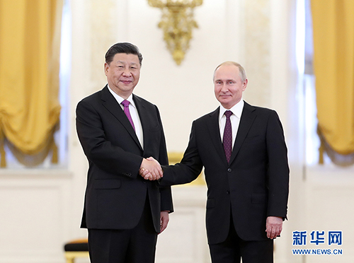 习近平同俄罗斯总统普京举行会谈 两国元首共同宣布 发展中俄新时代全面战略协作伙伴关系