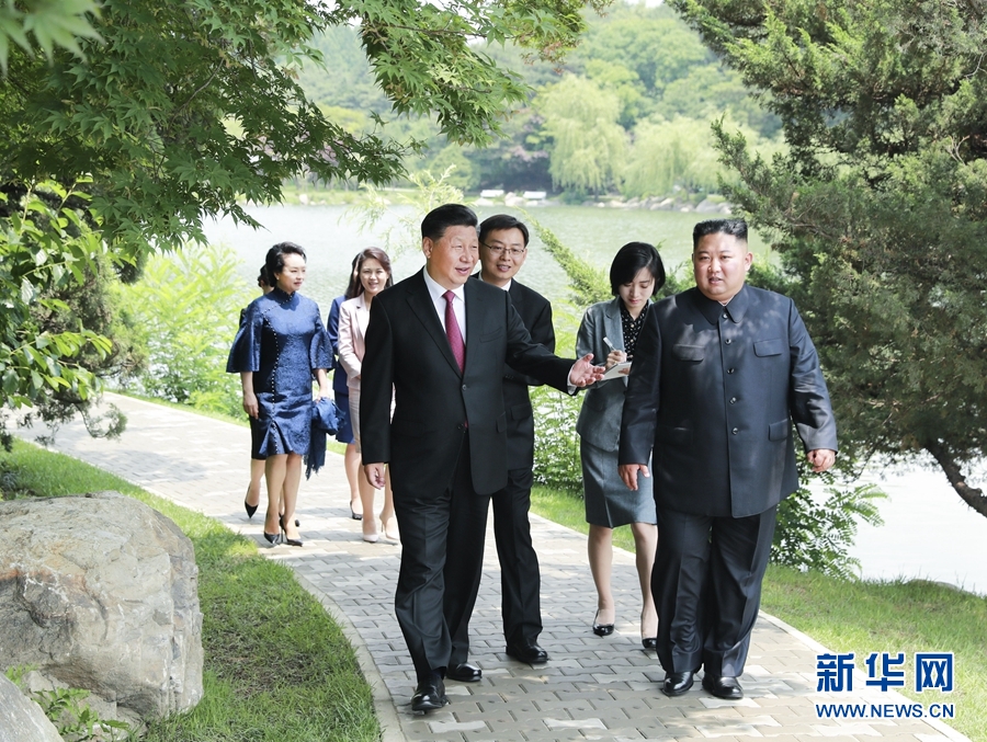 习近平会见朝鲜劳动党委员长、国务委员会委员长金正恩