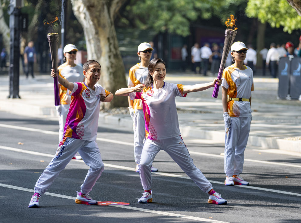 执炬奔跑，梦想生生不息——访杭州亚运会火炬手