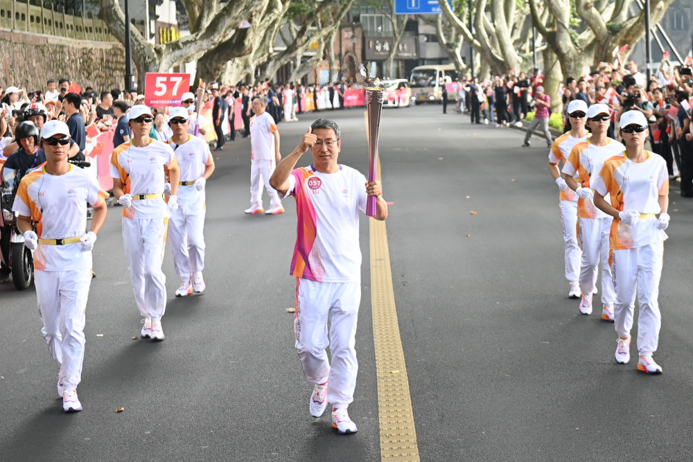 执炬奔跑，梦想生生不息——访杭州亚运会火炬手