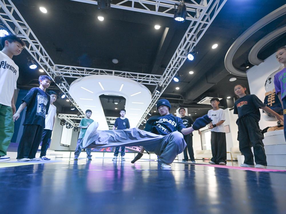 体育时评：启梦想无限 展气象万千