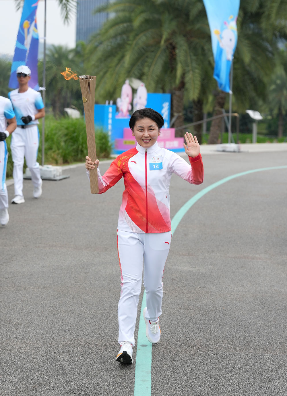 三地联动四城同传！第十五届全运会火炬传递活动举行