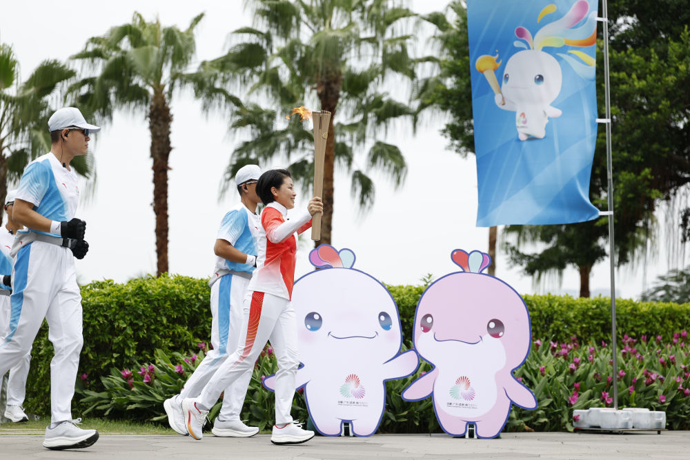 三地联动四城同传！第十五届全运会火炬传递活动举行