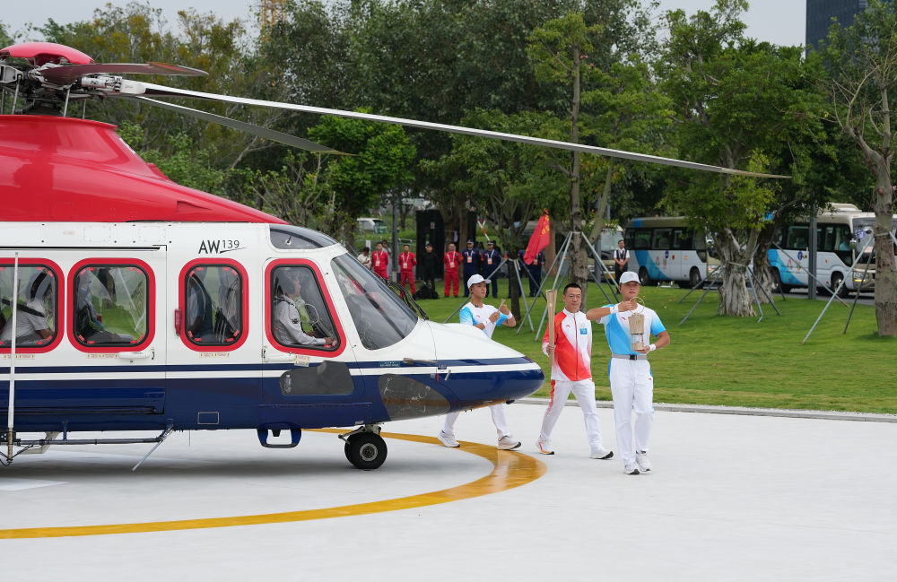 三地联动四城同传！第十五届全运会火炬传递活动举行