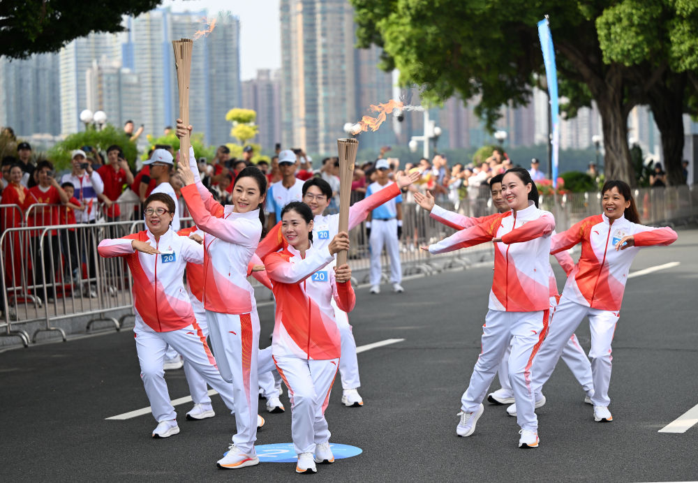 三地联动四城同传！第十五届全运会火炬传递活动举行