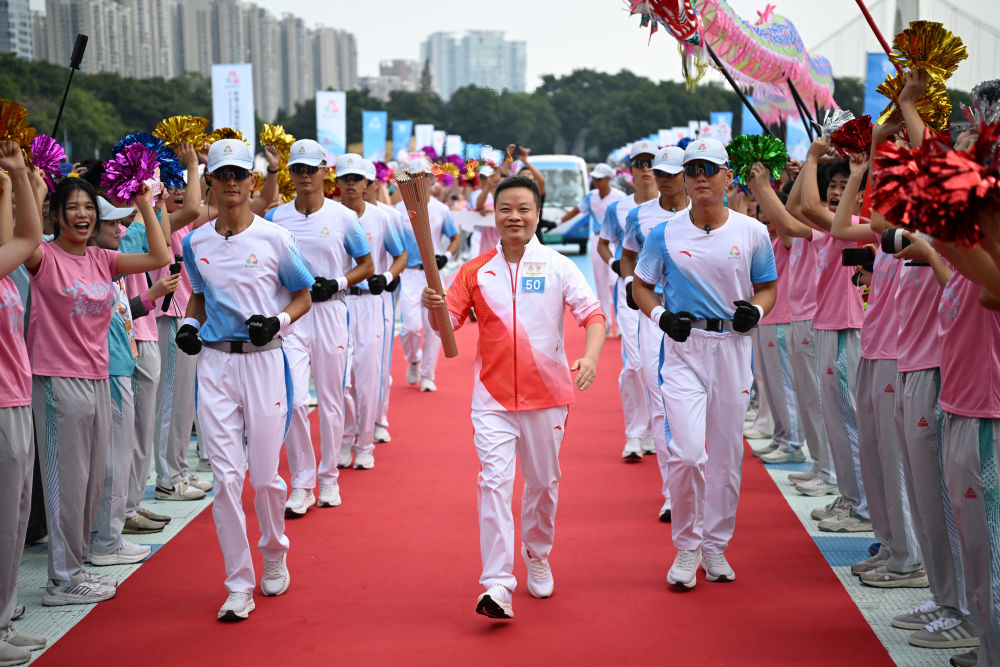 三地联动四城同传！第十五届全运会火炬传递活动举行
