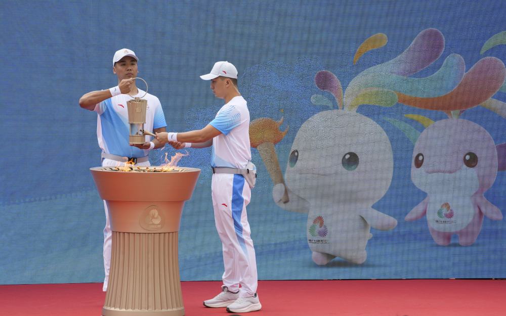 三地联动四城同传！第十五届全运会火炬传递活动举行