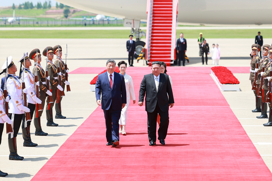 习近平抵达平壤开始对朝鲜进行国事访问