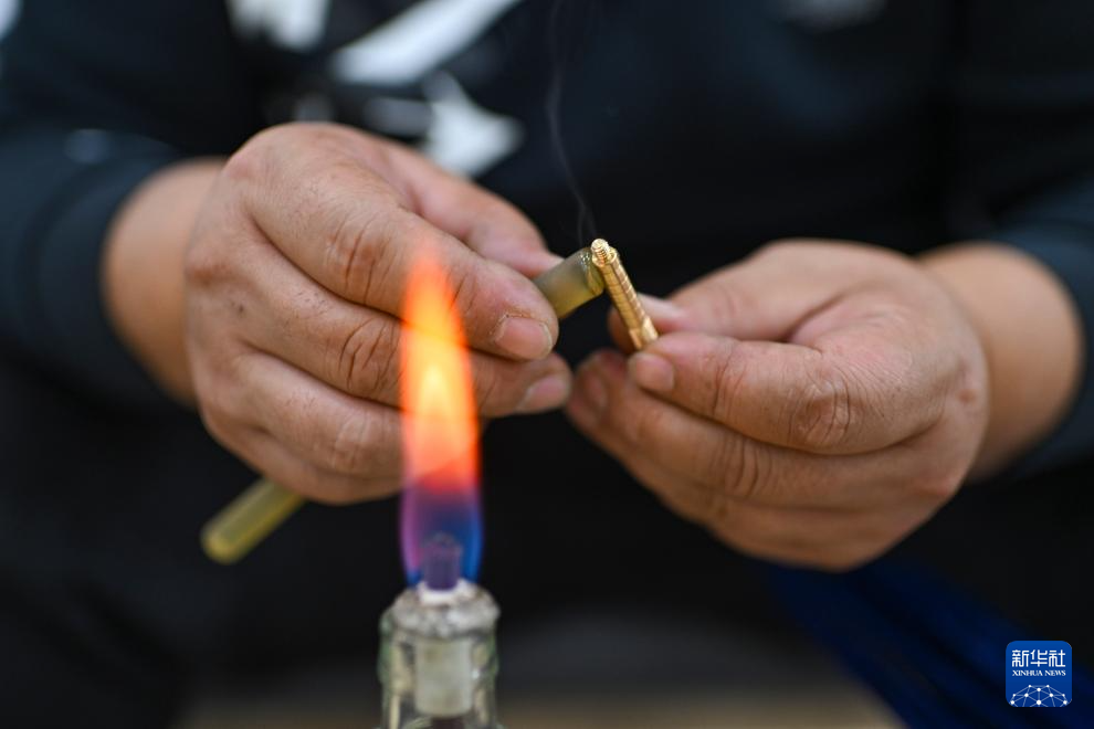 新时代中国调研行之文化中华丨“神箭手”吴俊亮:从冠军靶位到传承舞台