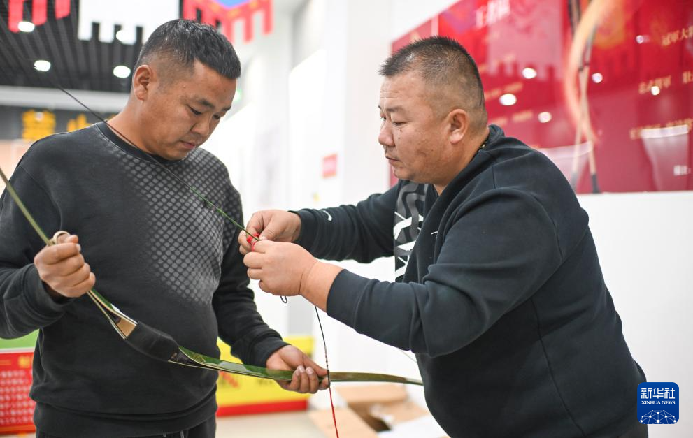 新时代中国调研行之文化中华丨“神箭手”吴俊亮:从冠军靶位到传承舞台