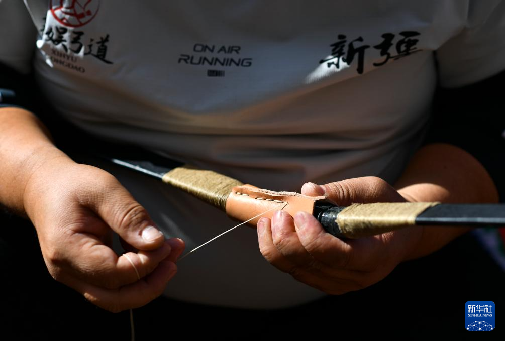 新时代中国调研行之文化中华丨“神箭手”吴俊亮:从冠军靶位到传承舞台