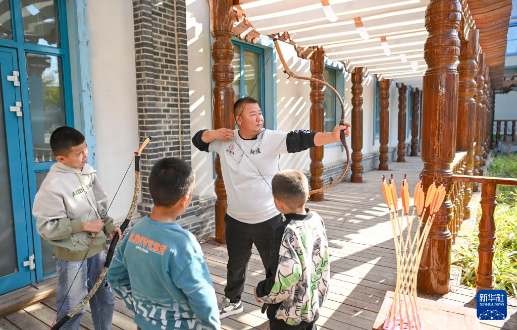 新时代中国调研行之文化中华丨“神箭手”吴俊亮:从冠军靶位到传承舞台