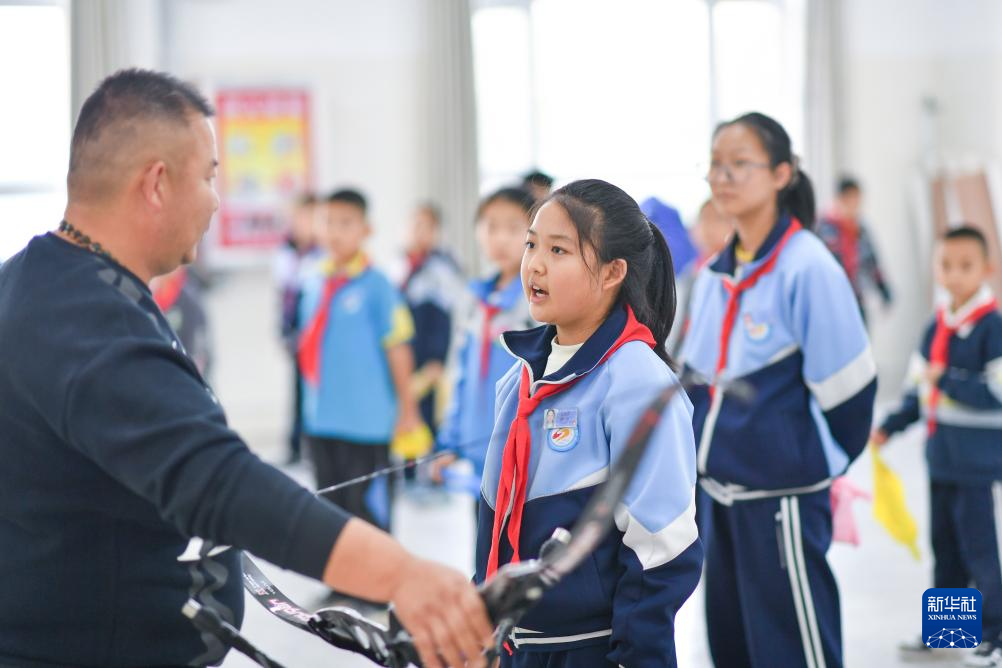 新时代中国调研行之文化中华丨“神箭手”吴俊亮:从冠军靶位到传承舞台