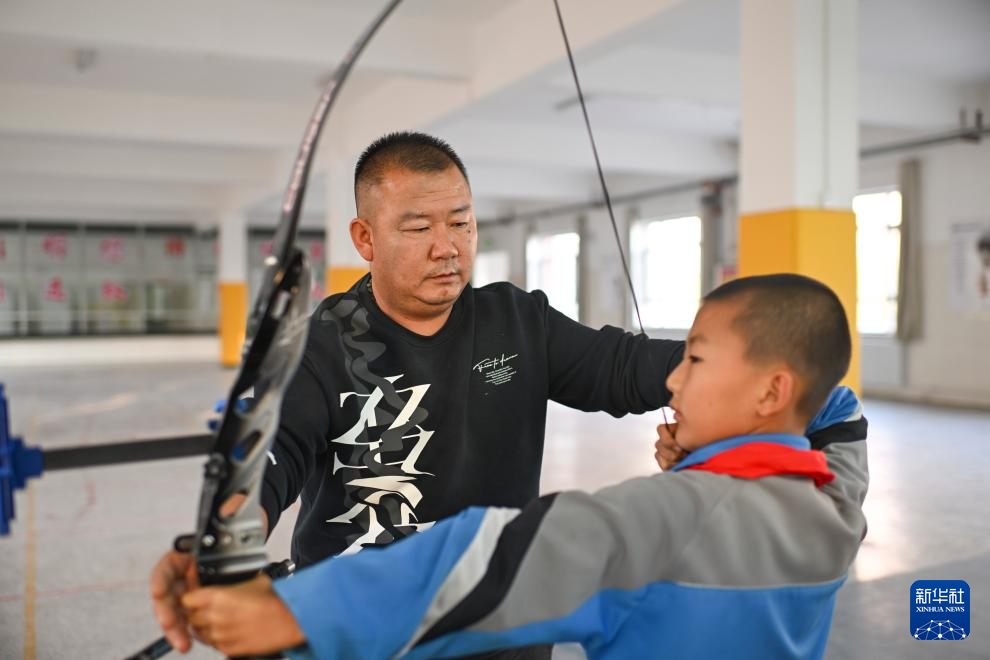新时代中国调研行之文化中华丨“神箭手”吴俊亮:从冠军靶位到传承舞台