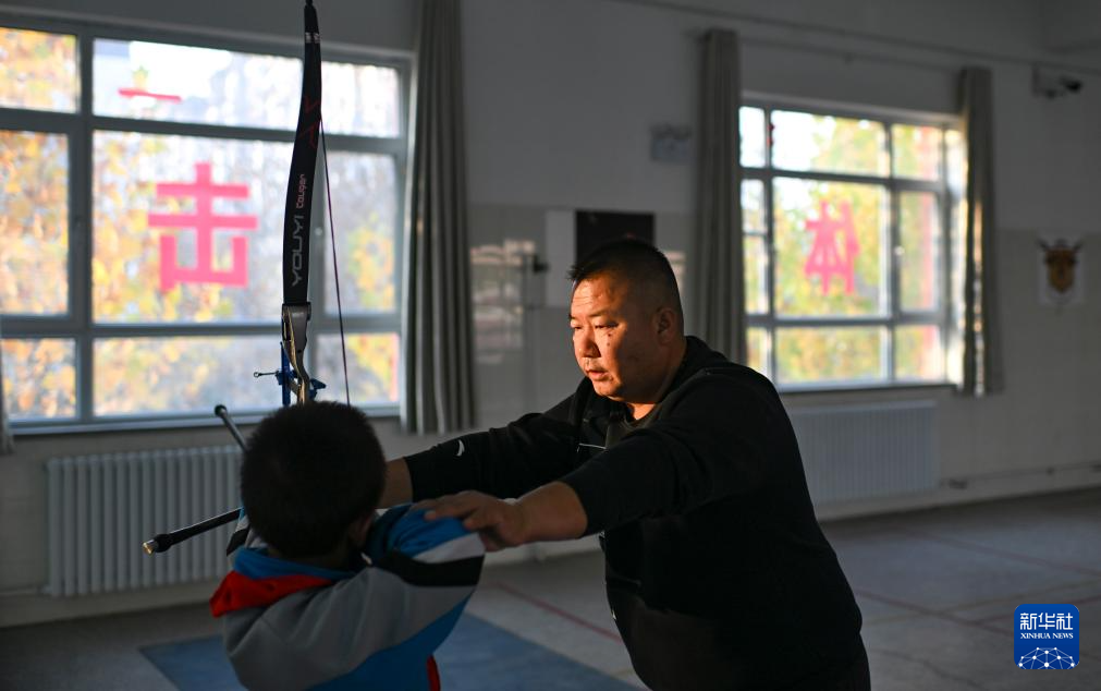 新时代中国调研行之文化中华丨“神箭手”吴俊亮:从冠军靶位到传承舞台