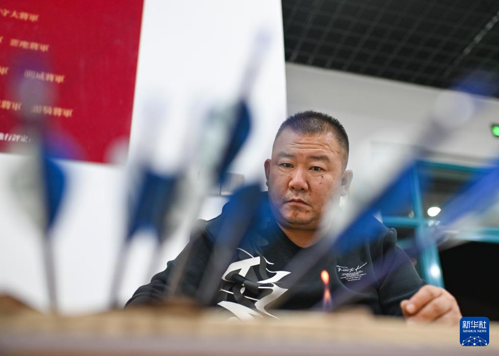 新时代中国调研行之文化中华丨“神箭手”吴俊亮:从冠军靶位到传承舞台