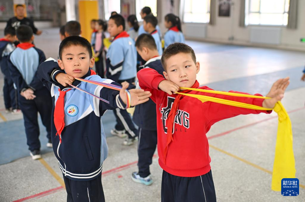 新时代中国调研行之文化中华丨“神箭手”吴俊亮:从冠军靶位到传承舞台