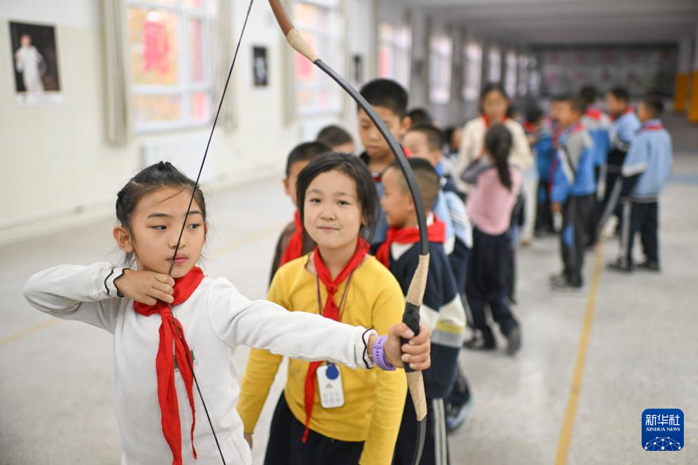 新时代中国调研行之文化中华丨“神箭手”吴俊亮:从冠军靶位到传承舞台