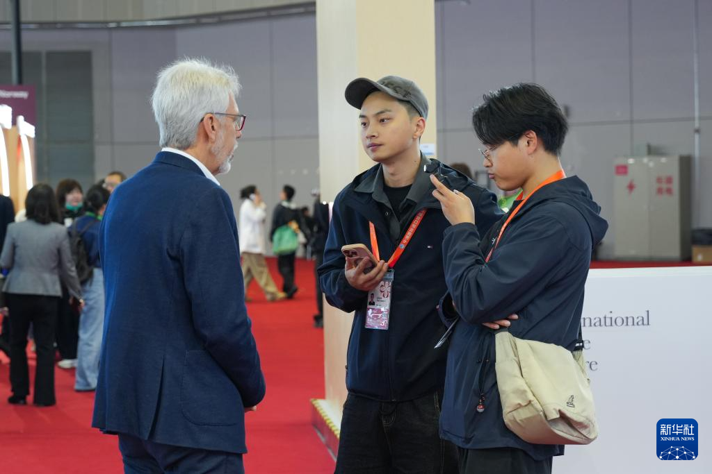 第八届进博会丨进博会上的记者节