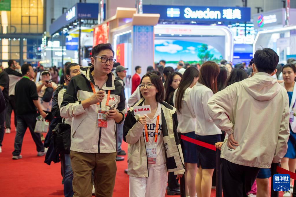 第八届进博会丨进博会上的记者节